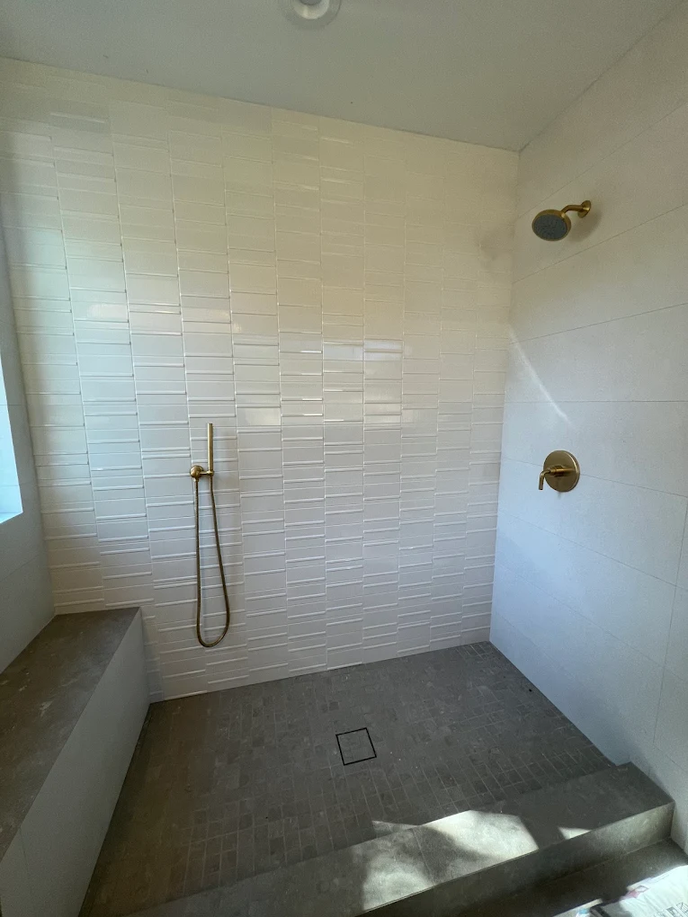 Walk-in shower bathroom remodel by EG Construction